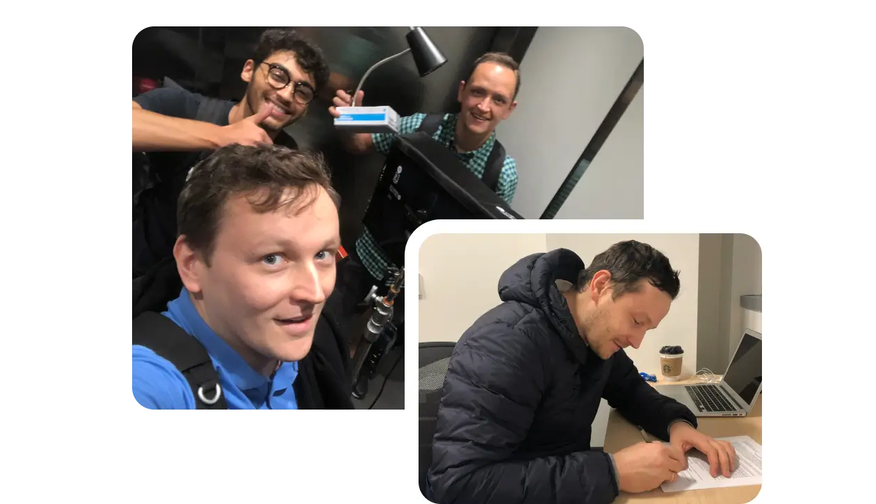 Anton Radchenko with colleagues and signing documents in office setting