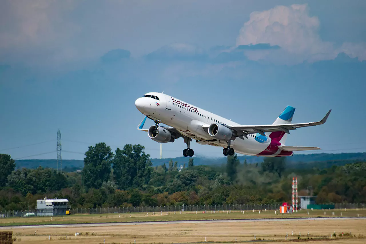 A Eurowings plane takes off from the runway